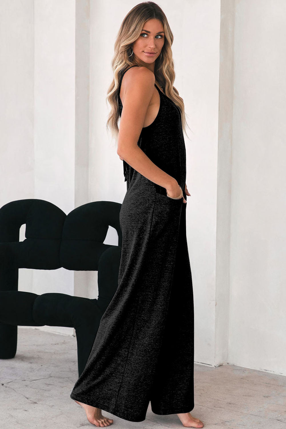 Black loose fitting, wide leg jumpsuit