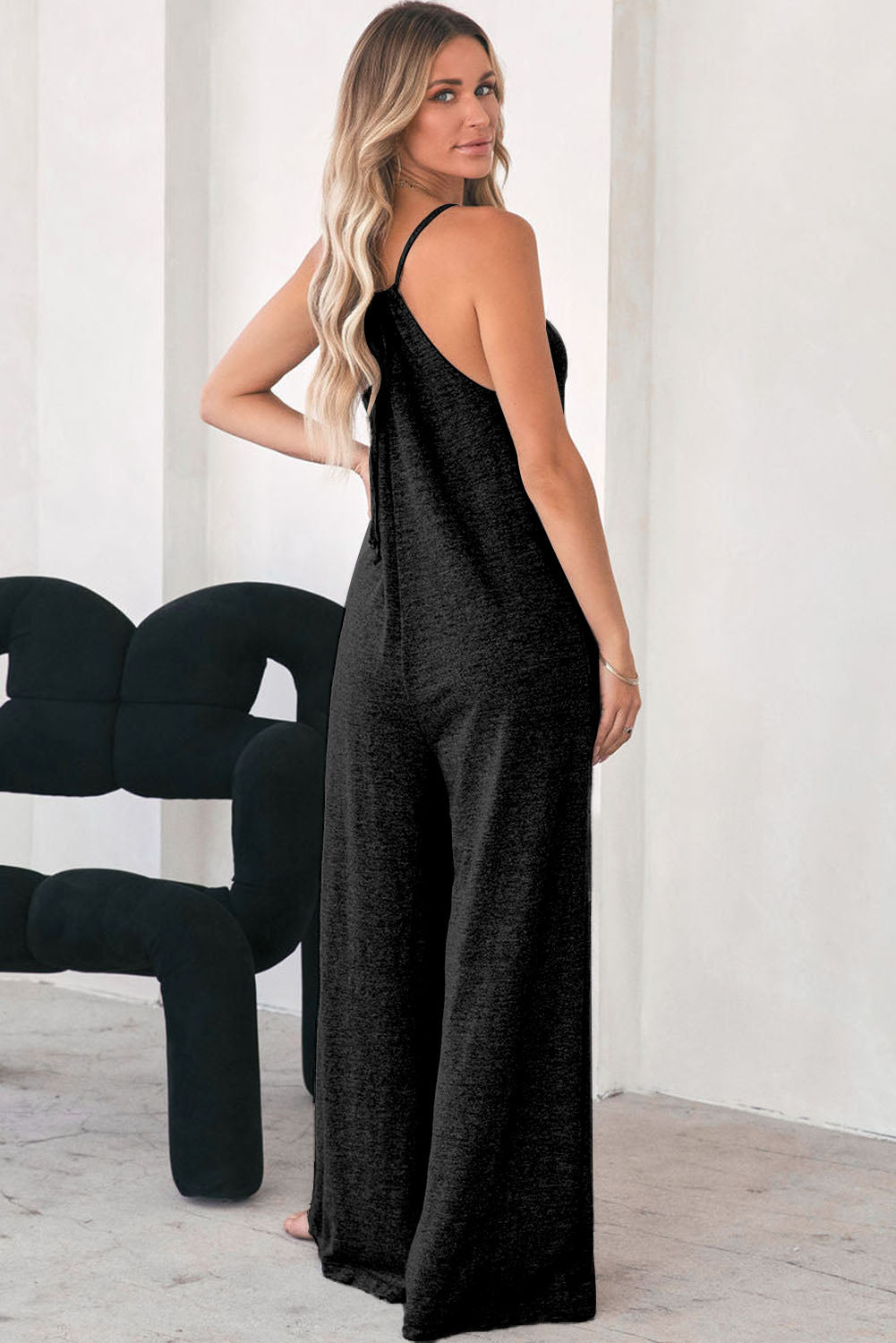 Black loose fitting, wide leg jumpsuit